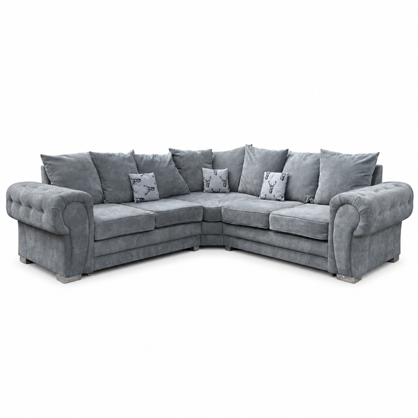 A gray fabric sectional sofa with rolled arms, a chaise lounge on the left, and two decorative throw pillows featuring a deer print, shown against a plain white background.